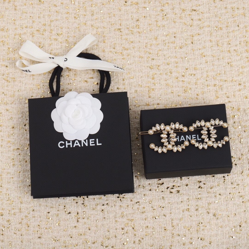 Ch*el brooches